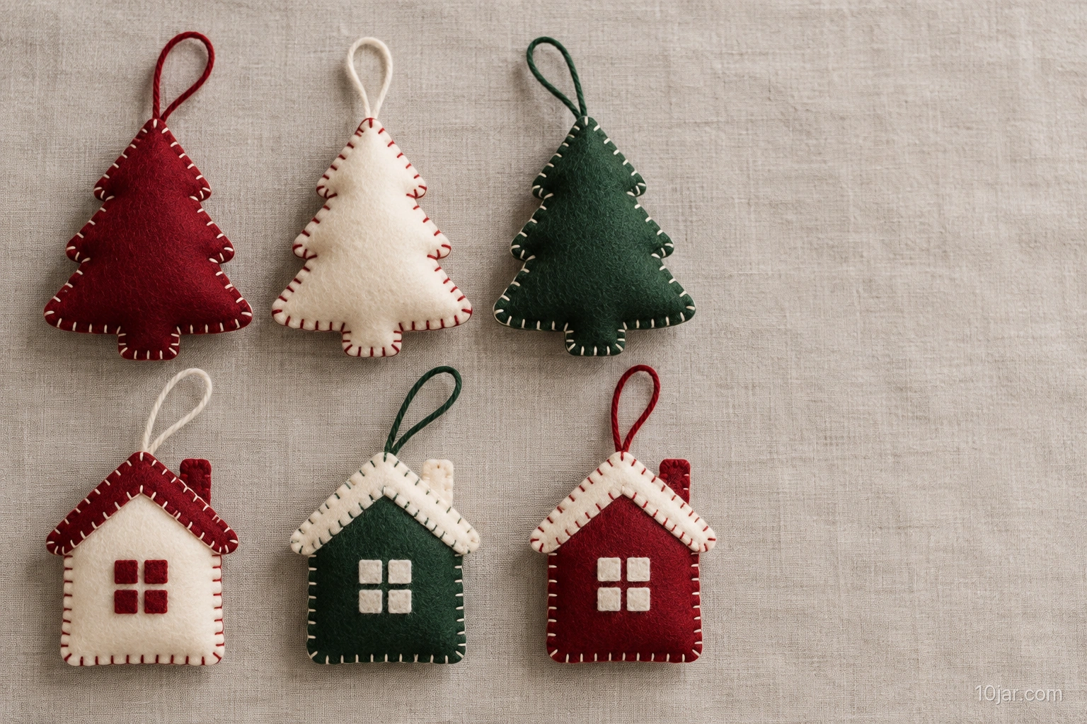 Exactly six hand-stitched red green and cream felt ornaments displayed together with closed seams and simple hanging loops